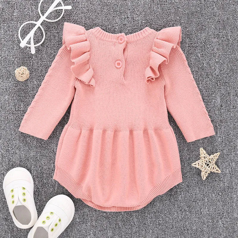 Baby girl's pink cotton princess romper with placket closure