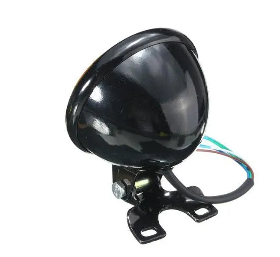 Round bottom mount motorcycle headlight with black aluminium shell, amber glass lens, 12.5 x 8.5 cm, front placement