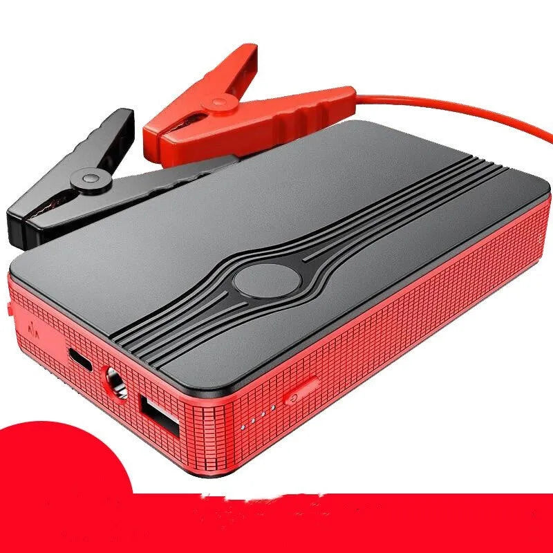 Red K4-E automotive emergency jump starter and power bank unit with charging cable.