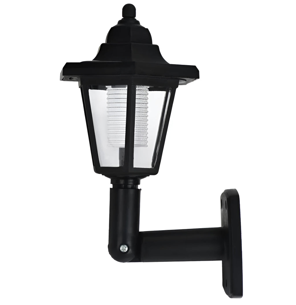 Black hexagonal solar-powered wall lamp for outdoor garden use.