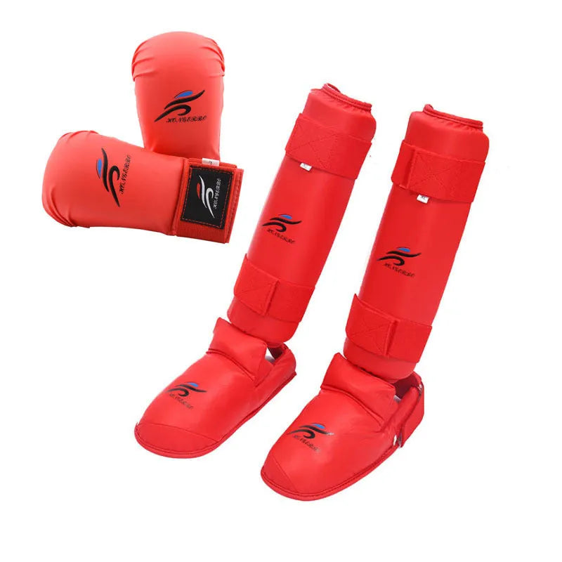 Karate protective gear set with red boxing gloves, leg guards, and helmet for martial arts training