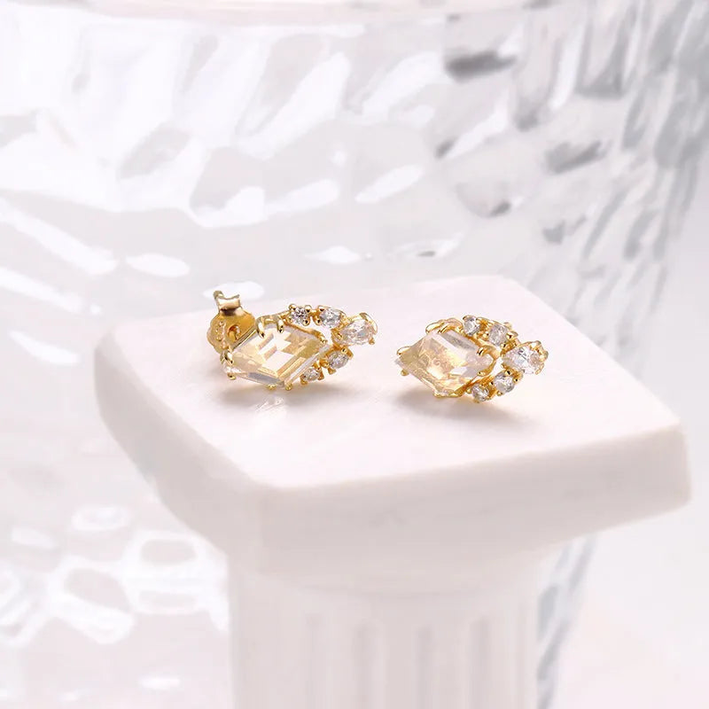 Geometric sweet white crystal stud earrings made from electroplated 925 sterling silver