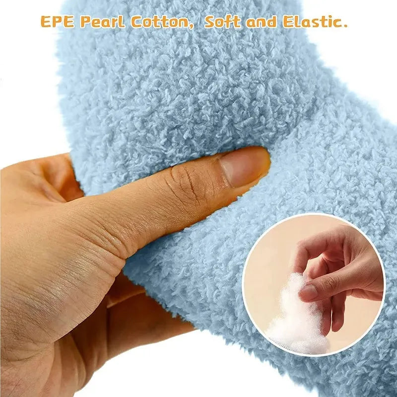 Small U-shaped plush pet pillow in blue for cats and small dogs on a white background.