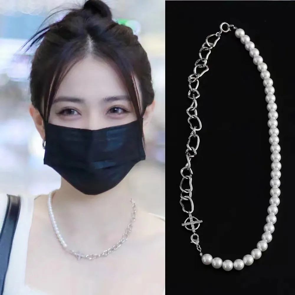 White acrylic geometric pendant necklace with asymmetric design on twisted chain, clavicle length
