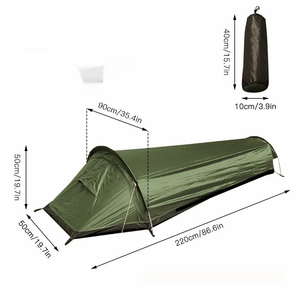 Single person sleeping bag tent in army green set up outdoors, showing rain fly and aluminium rod poles.