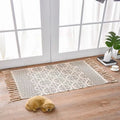 Handwoven cotton linen floor mat 60x90cm with tassel detailing in ethnic style