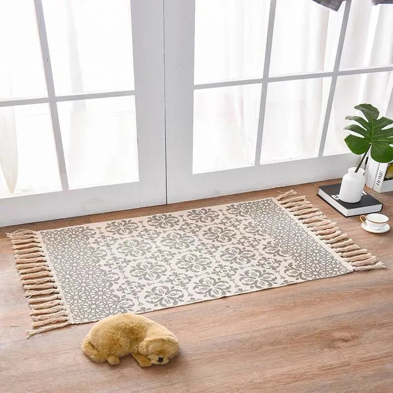 Handwoven cotton linen floor mat 60x90cm with tassel detailing in ethnic style