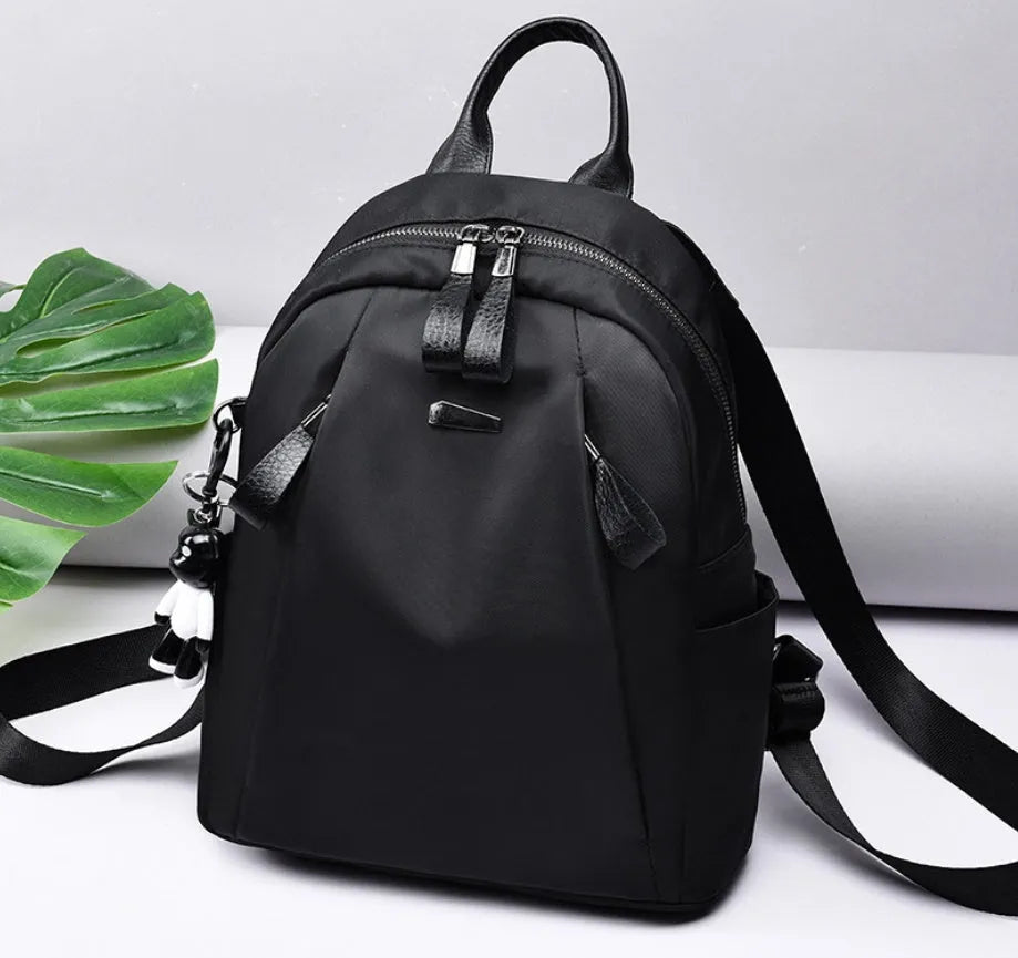 Medium square Oxford cloth rucksack in wine red with double straps and soft handle