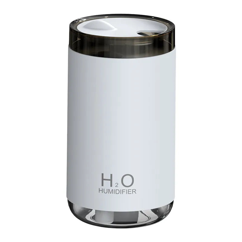 Jellyfish-shaped USB humidifier with smoke ring mist output and warm night light in blue colour