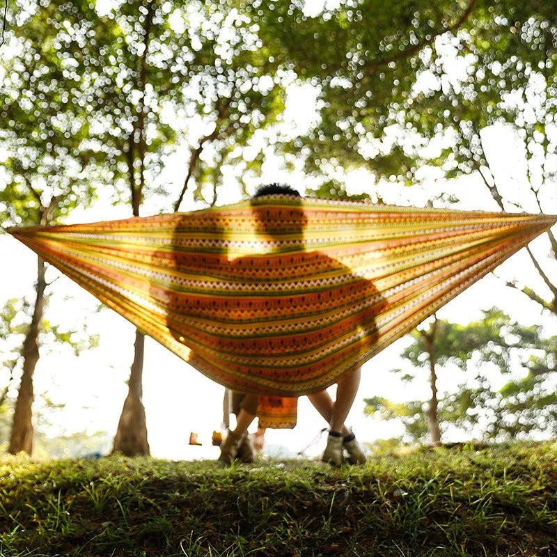 Bohemian yellow polyester parachute cloth hammock measuring 260x140cm for outdoor camping and park use