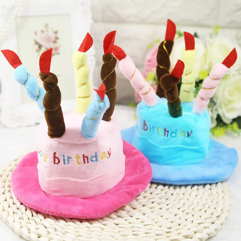A blue or pink birthday hat for toy dogs on a white background.