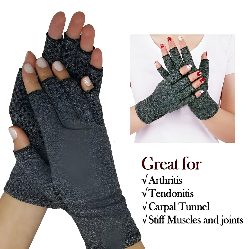 Grey half-finger joint compression gloves with anti-slip palm on a flat surface.