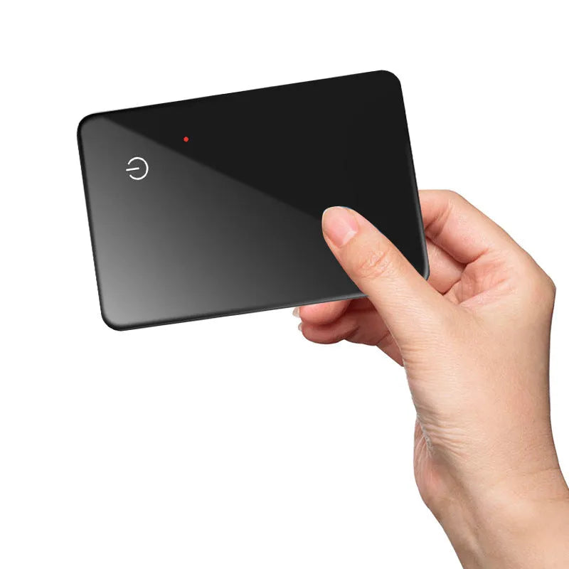 Black rectangular pet tracker card with hanging hole, showing NFC and wireless charging features
