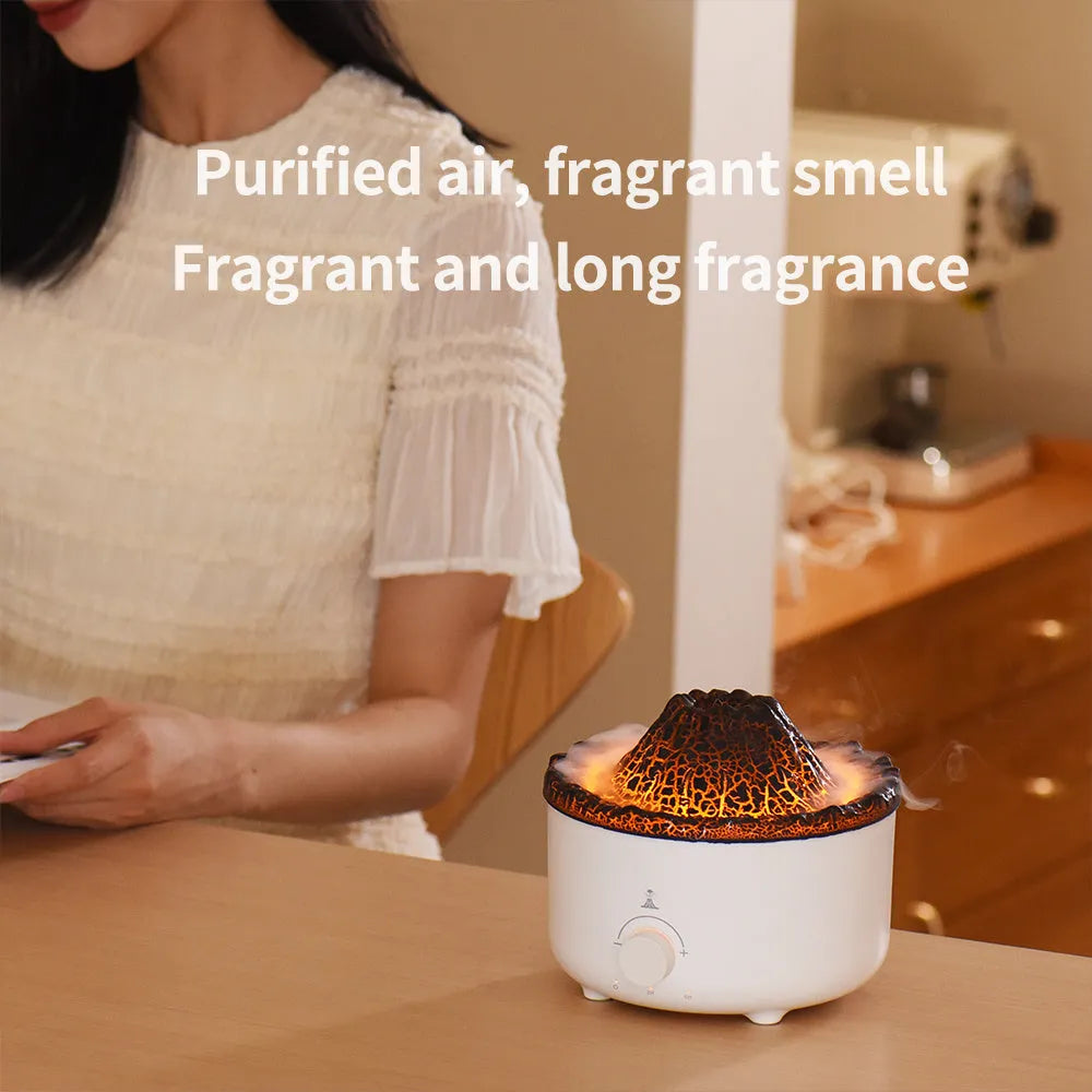 White simulated flame volcano humidifier with remote control showing orange and blue lighting effects