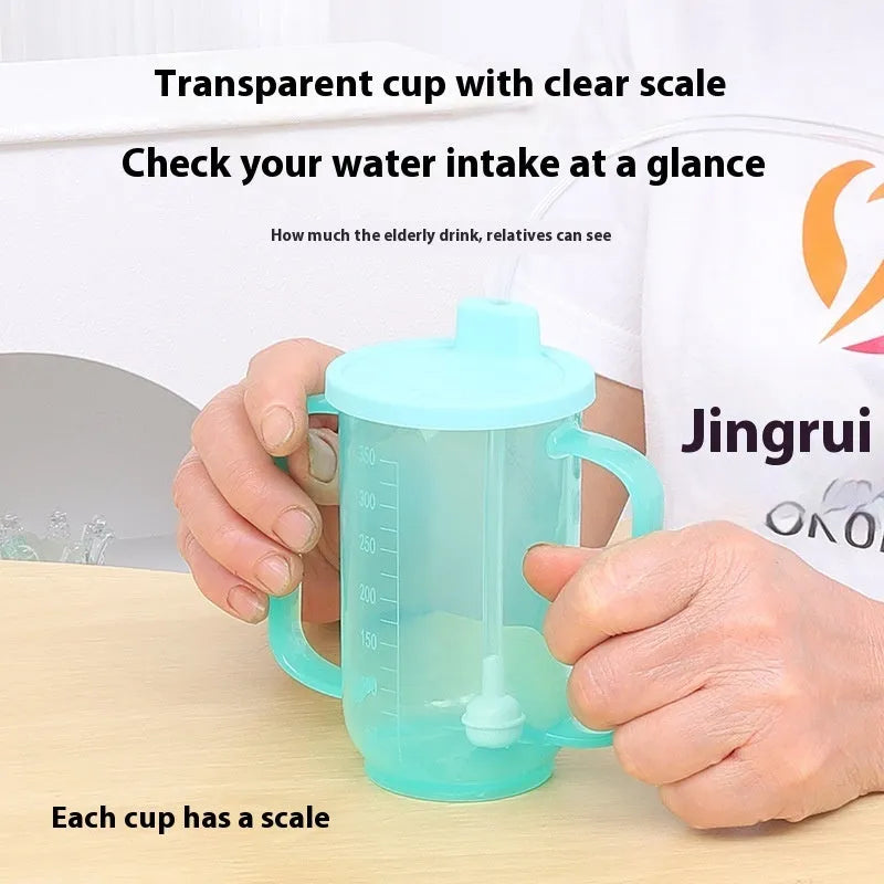 Oblique mouth choke-proof drinking cup with handle and lid, shown in bed care setting.