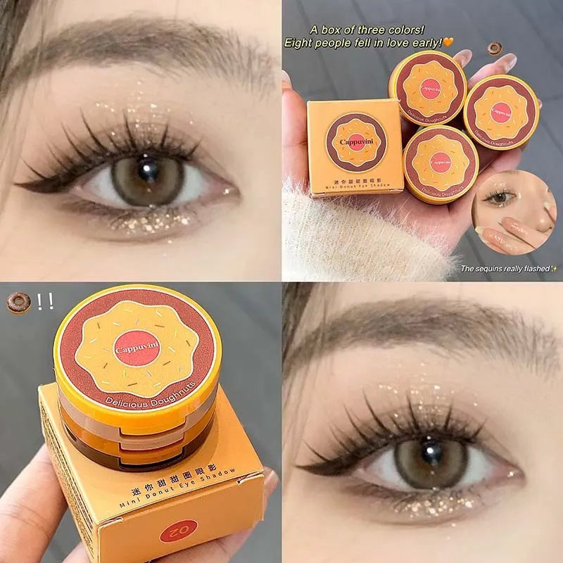 Mini donut eye shadow palette with three pink and brown shades in a thin compact