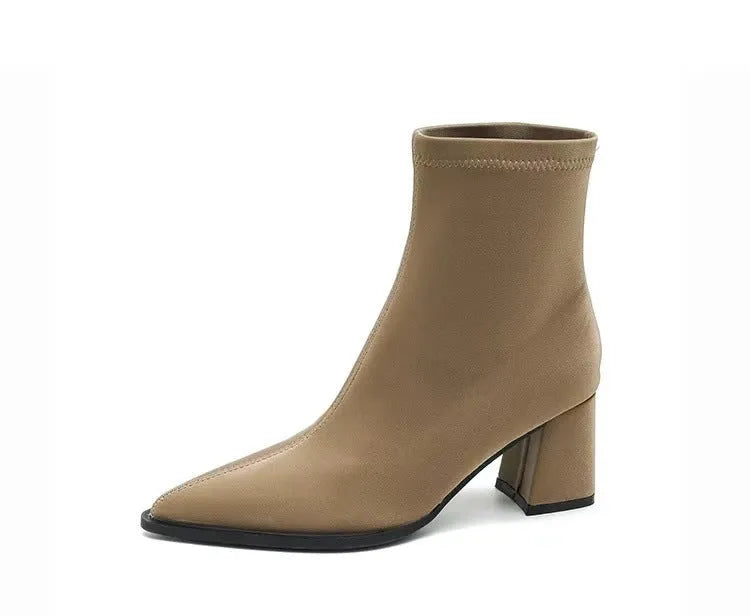 Women's khaki pointed toe Martin boots with a wedge heel on a white background.