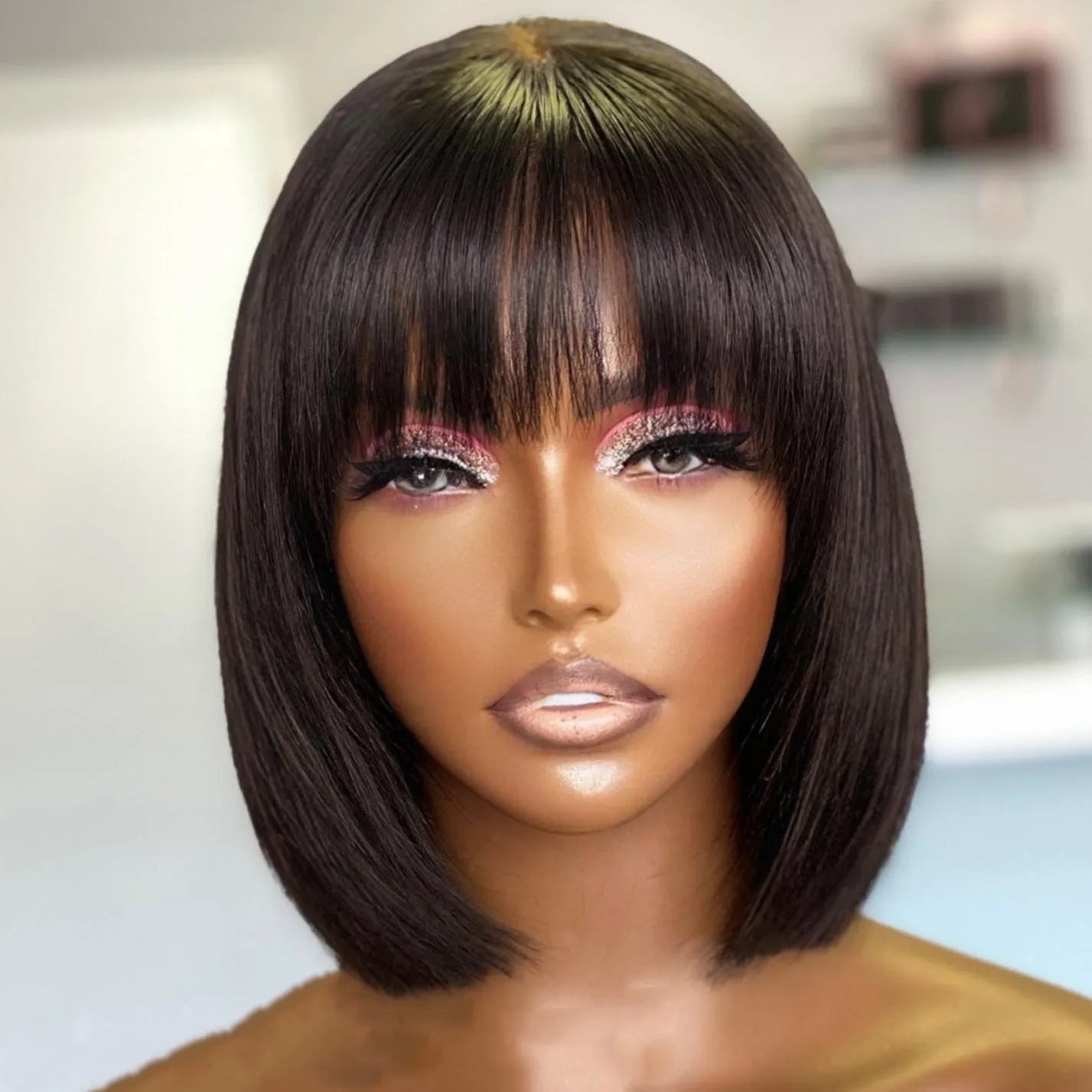 Su Bob's human hair lace wig 10 inch natural style black colour on a mannequin head
