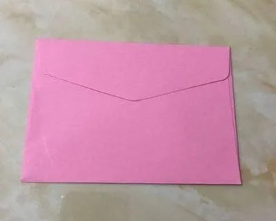 Pack of mini coloured non-printed paper envelopes in various colours, showing size of 11.5 by 8 cm.