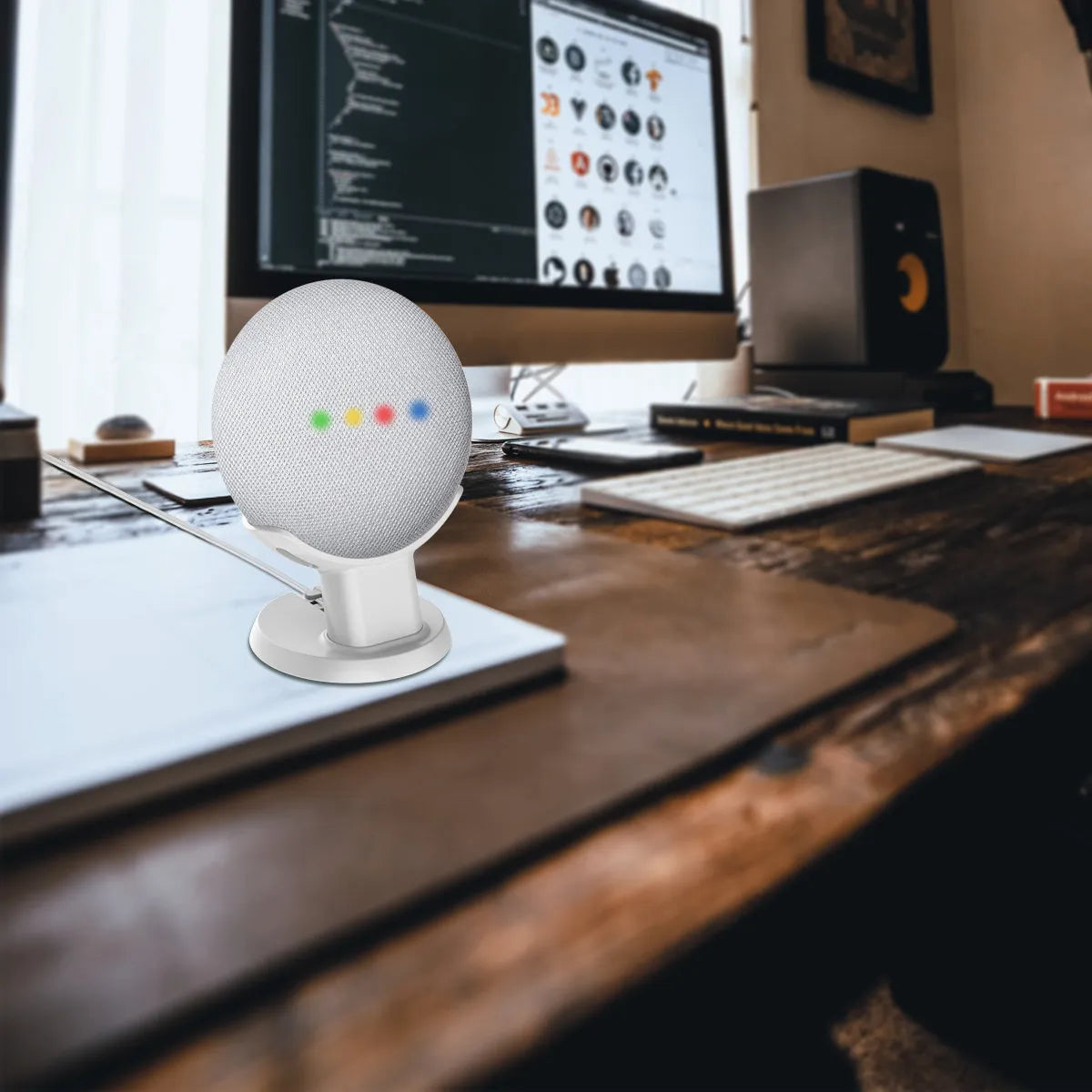 PlusAcc black plastic stand holder for Google Home Mini voice assistant on a table