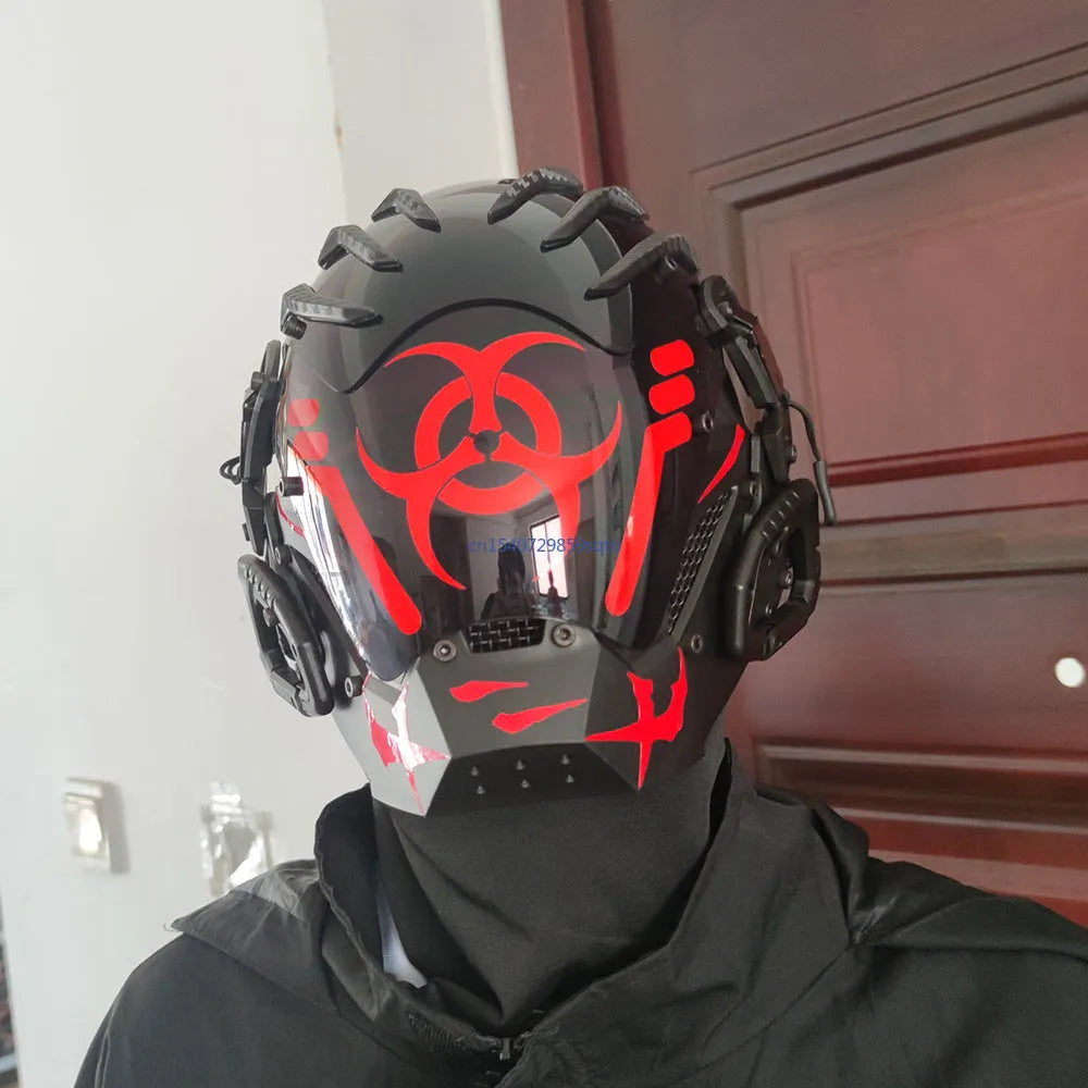 Black full-face polymer helmet with tech design, shown on a stand against a dark background.