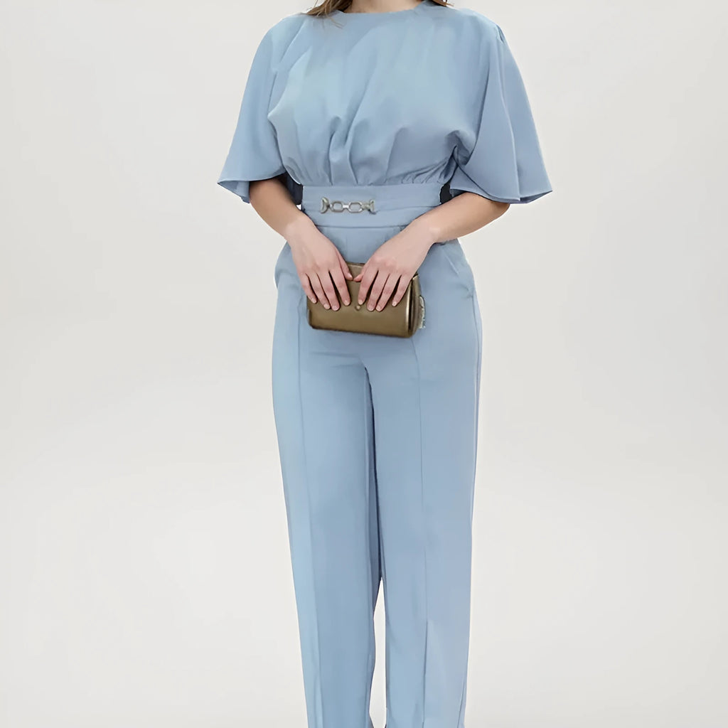 Blue polyester men's formal suit with long sleeve jacket and trousers on a hanger.