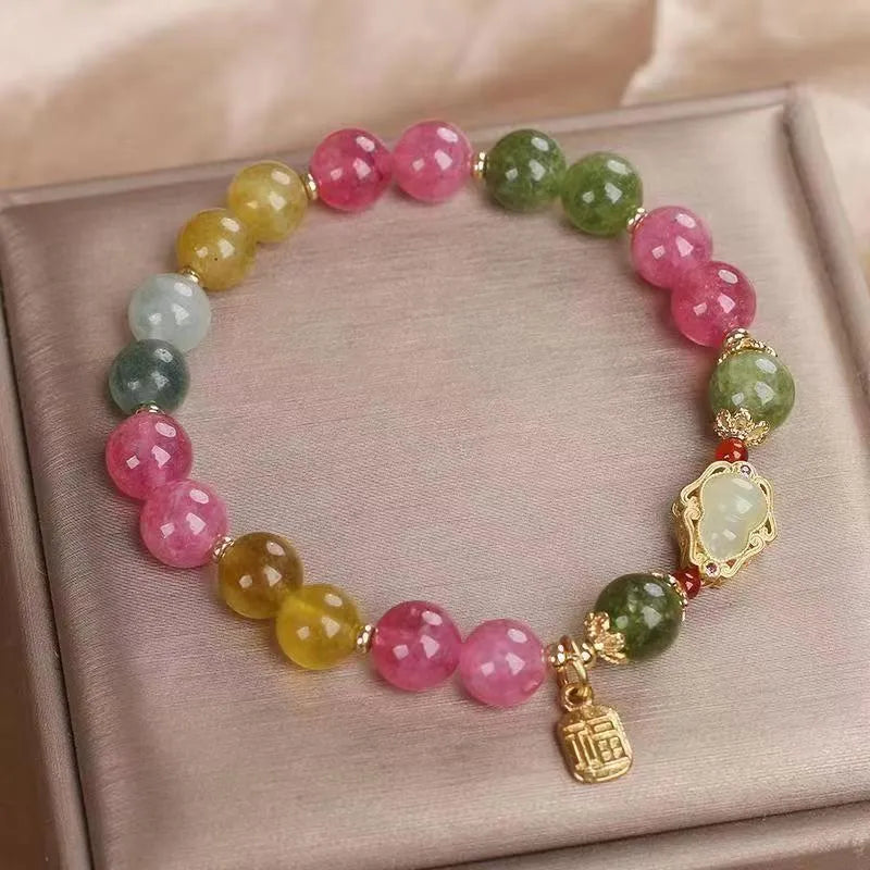 Women's bracelet with colourful tourmaline beads and electroplated gourd blessing card and flower charms