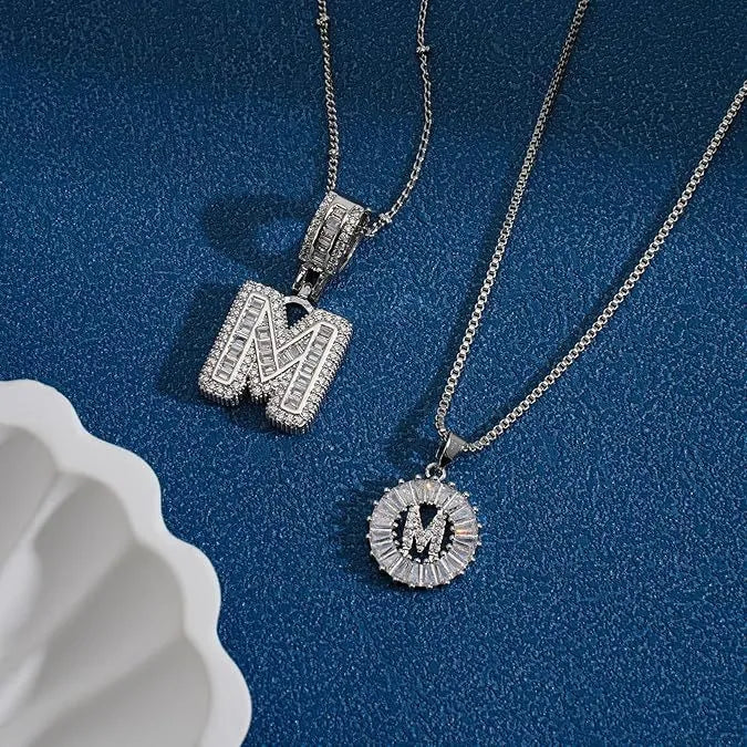 26 English letters copper-plated gold diamond initial pendant necklace with adjustable chain on display