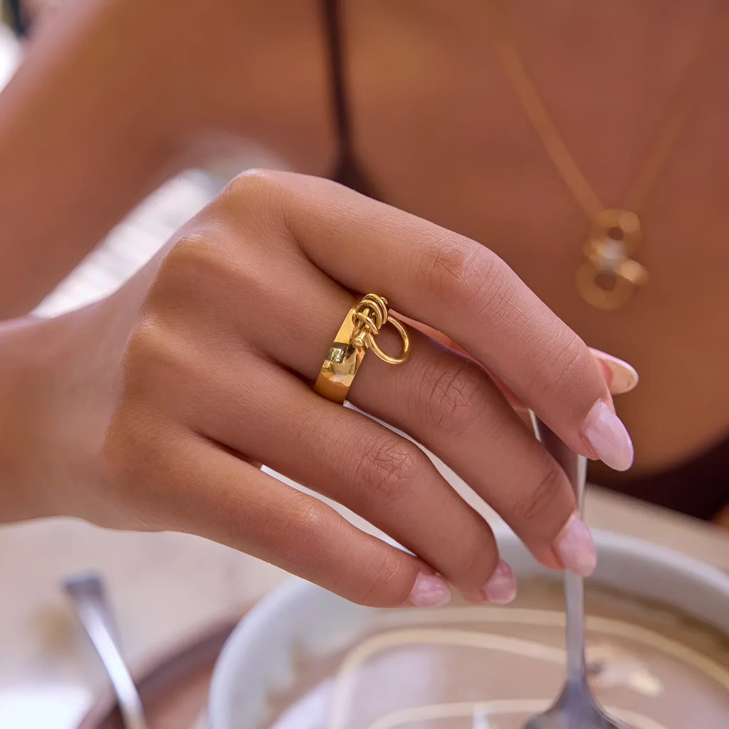 18K gold stainless steel women's open ring with geometric horseshoe motif on a titanium steel band