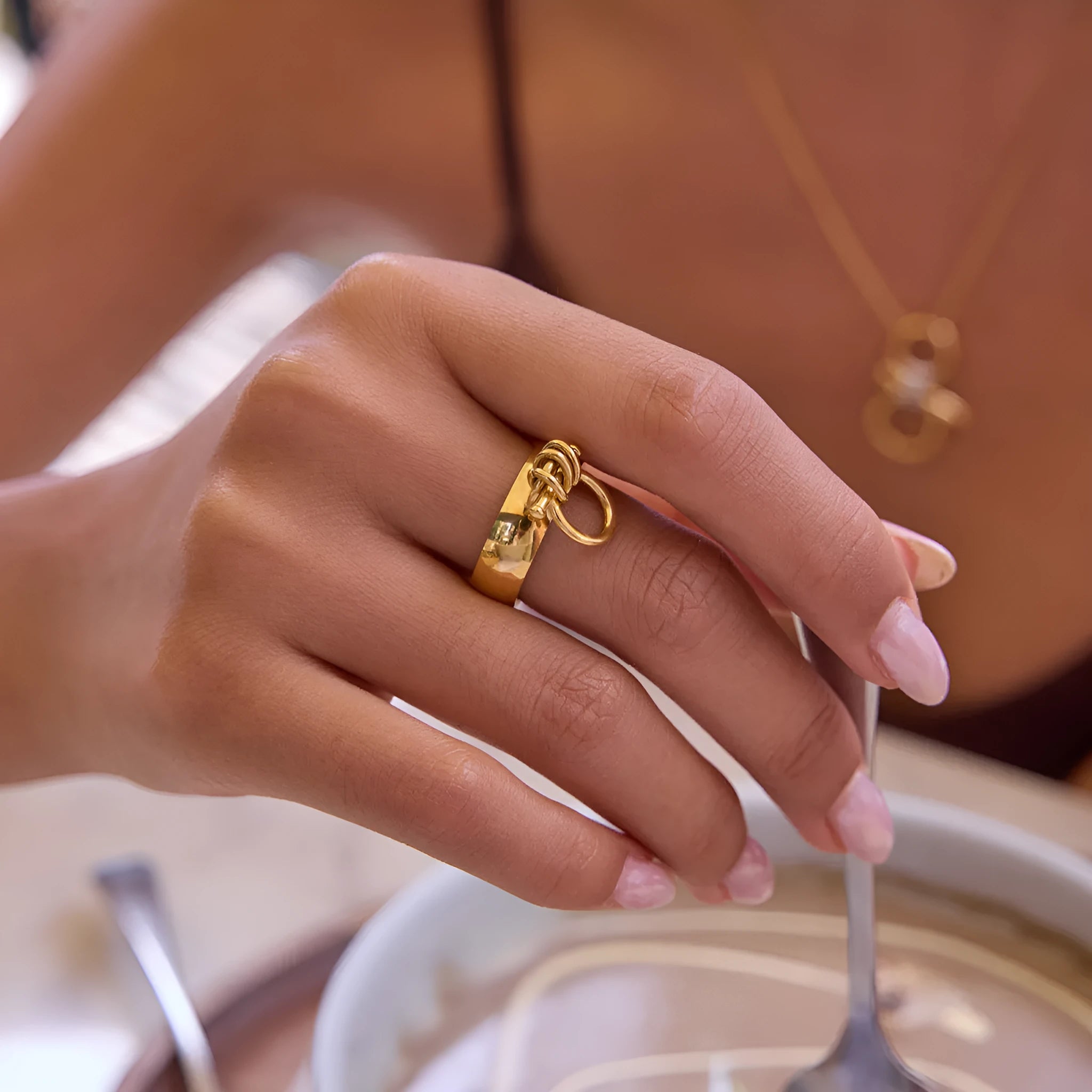 18K gold stainless steel women's open ring with geometric horseshoe motif on a titanium steel band