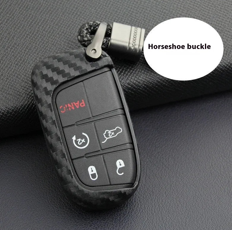 Carbon fibre pattern silicone protective case for a Dodge, Chrysler, or Fiat car key remote with a large head buckle.