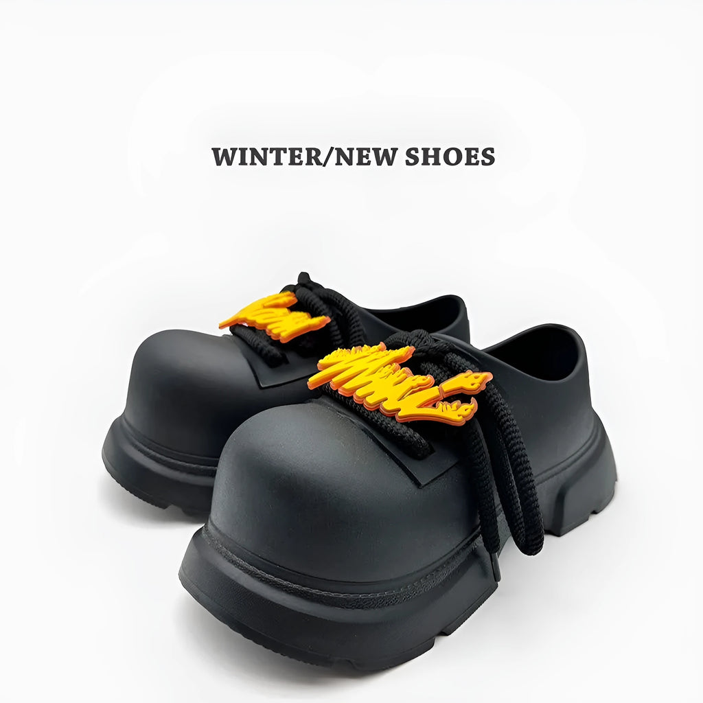 Black Warrior colour thick sole casual shoes for men and women with height increase design.