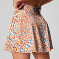 Women's high waist half-length sports skirt in blue, shown for golf or tennis.