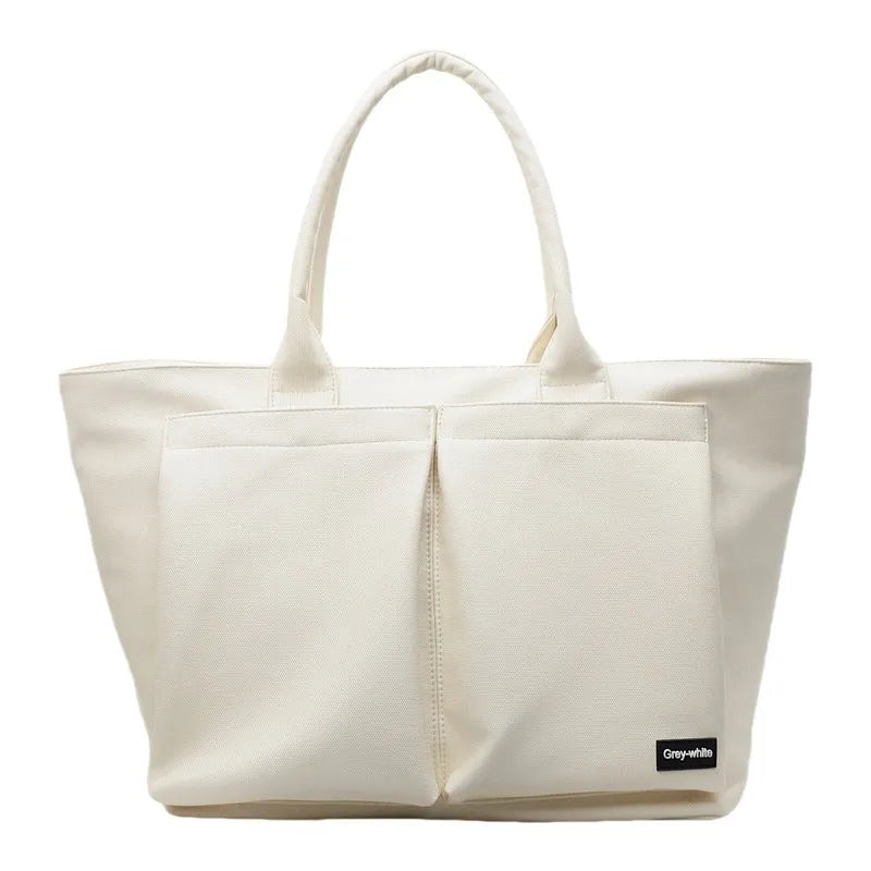 Lightweight PU shoulder bag in black, green, or white with 20-35 litre capacity