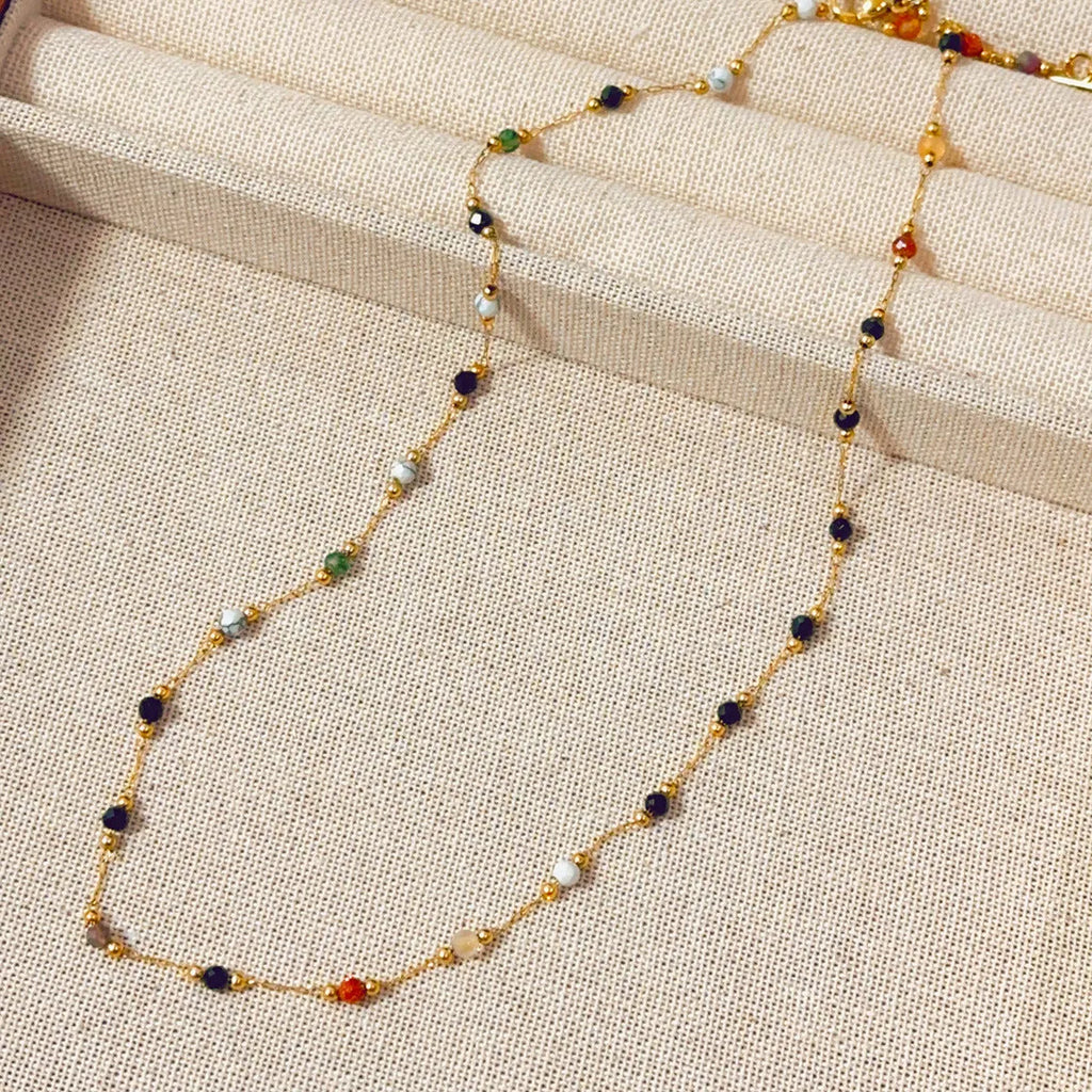 Gold-coloured titanium steel necklace with a retro O-ring chain and simple pendant.