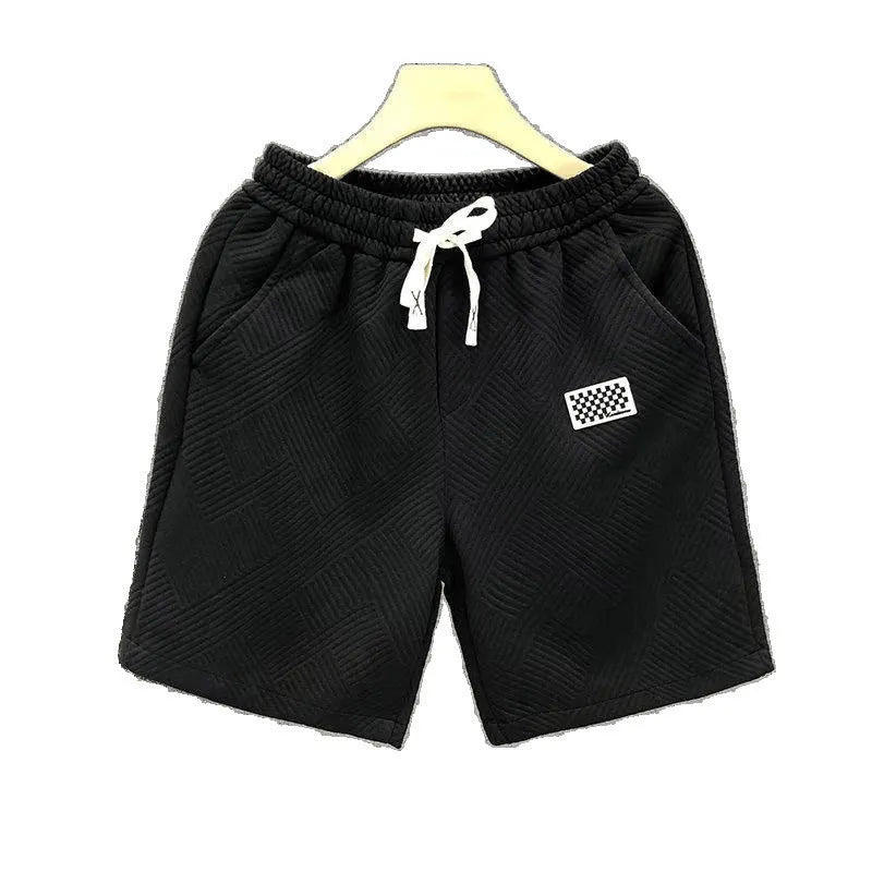Men's elastic waist sports shorts in solid colours with micro elastic polyester fabric