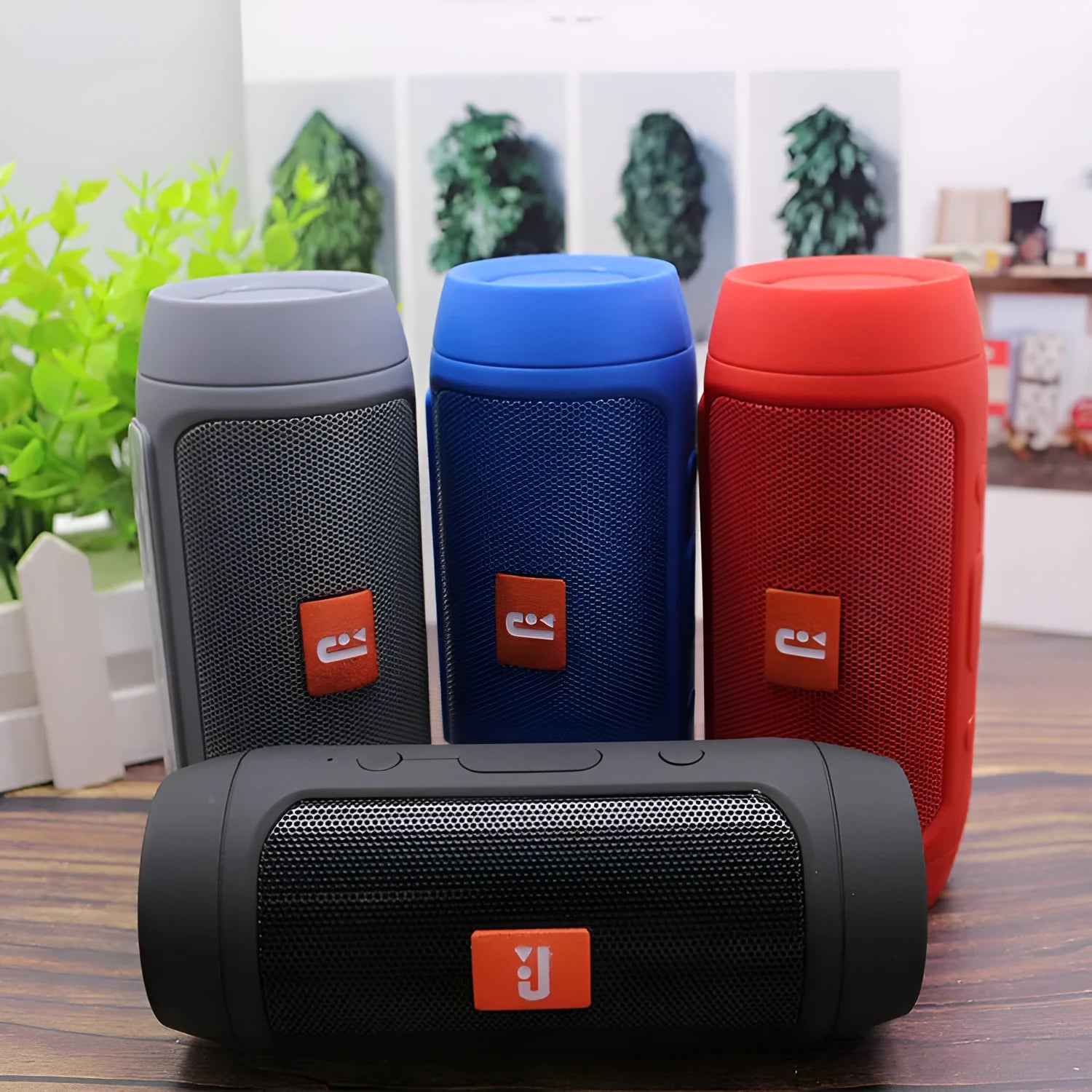 Waterproof Bluetooth speaker in black with USB charging port and control buttons