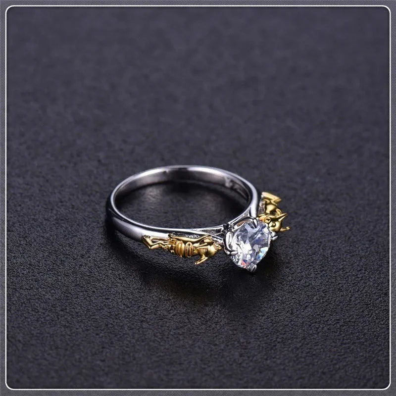 Detailed copper crown ring with crystal accents on a finger, showing black gold and copper finish options.