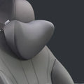 Car headrest and neck pillow with silky nylon cover and memory cotton core, 29cm by 21cm by 15cm, in Apricot colour