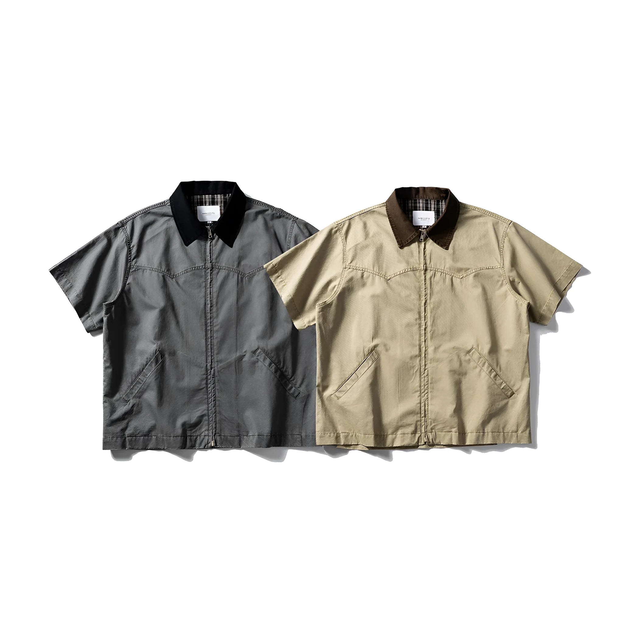 Short sleeve loose cotton overalls shirt in khaki colour on a hanger