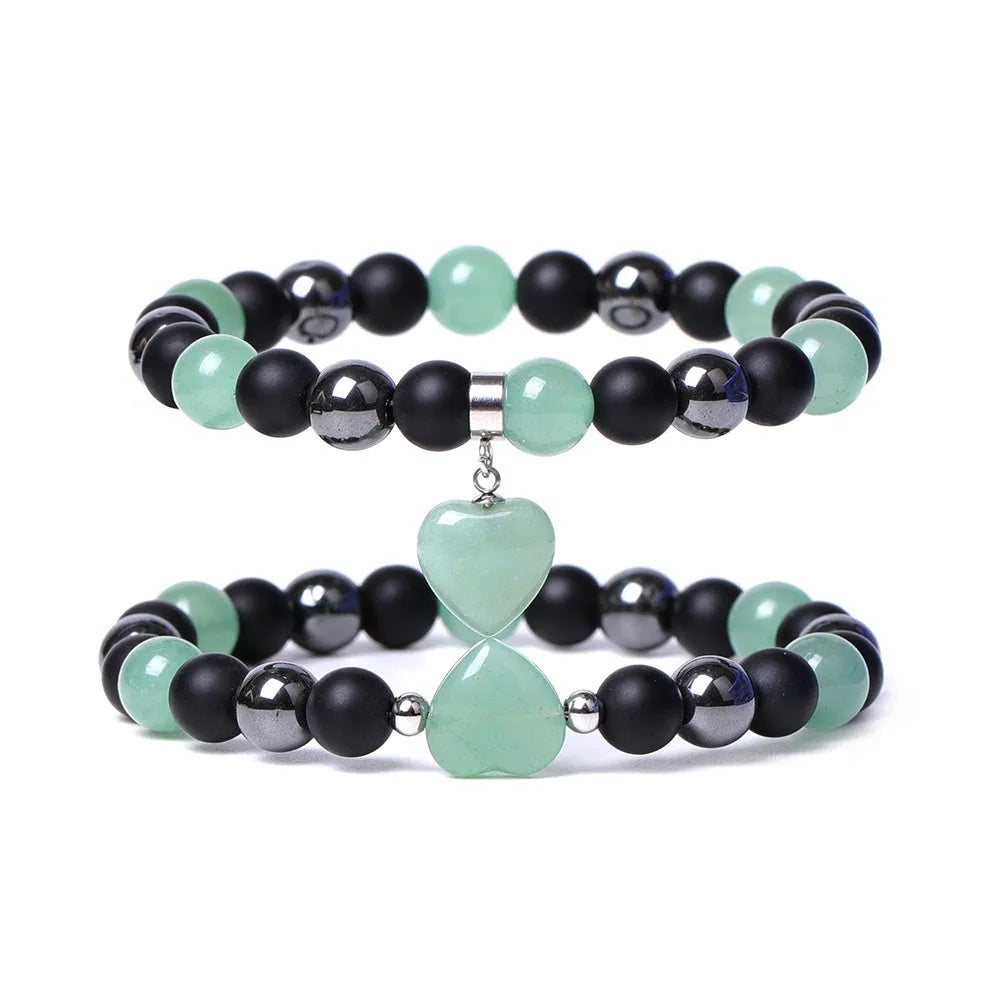 Hand-cut peach heart stone bracelet with geometric moon planet design in Tigereye colour