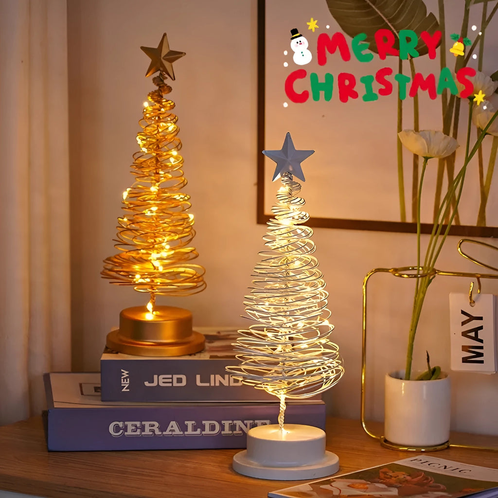 33cm wrought iron Christmas tree spiral light ornament with warm white LED illumination on table