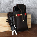 Men's brown leather hanging belt bag for a mobile phone with retro car suture detailing.