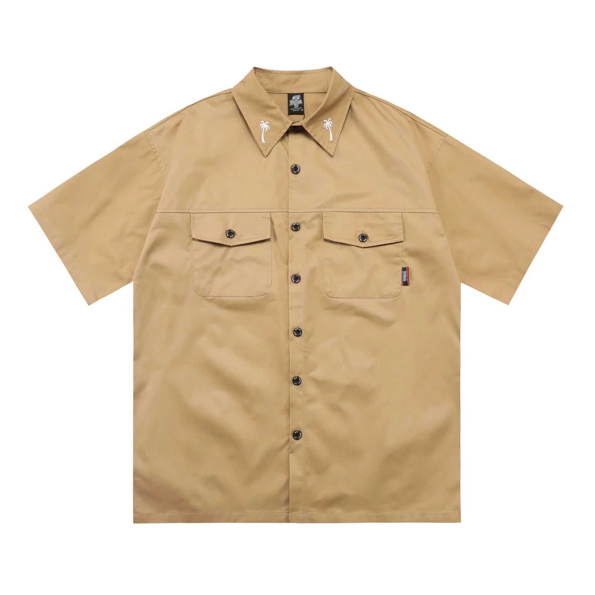 Man's black loose-fit pocket shirt with embroidery and half sleeves on a hanger.