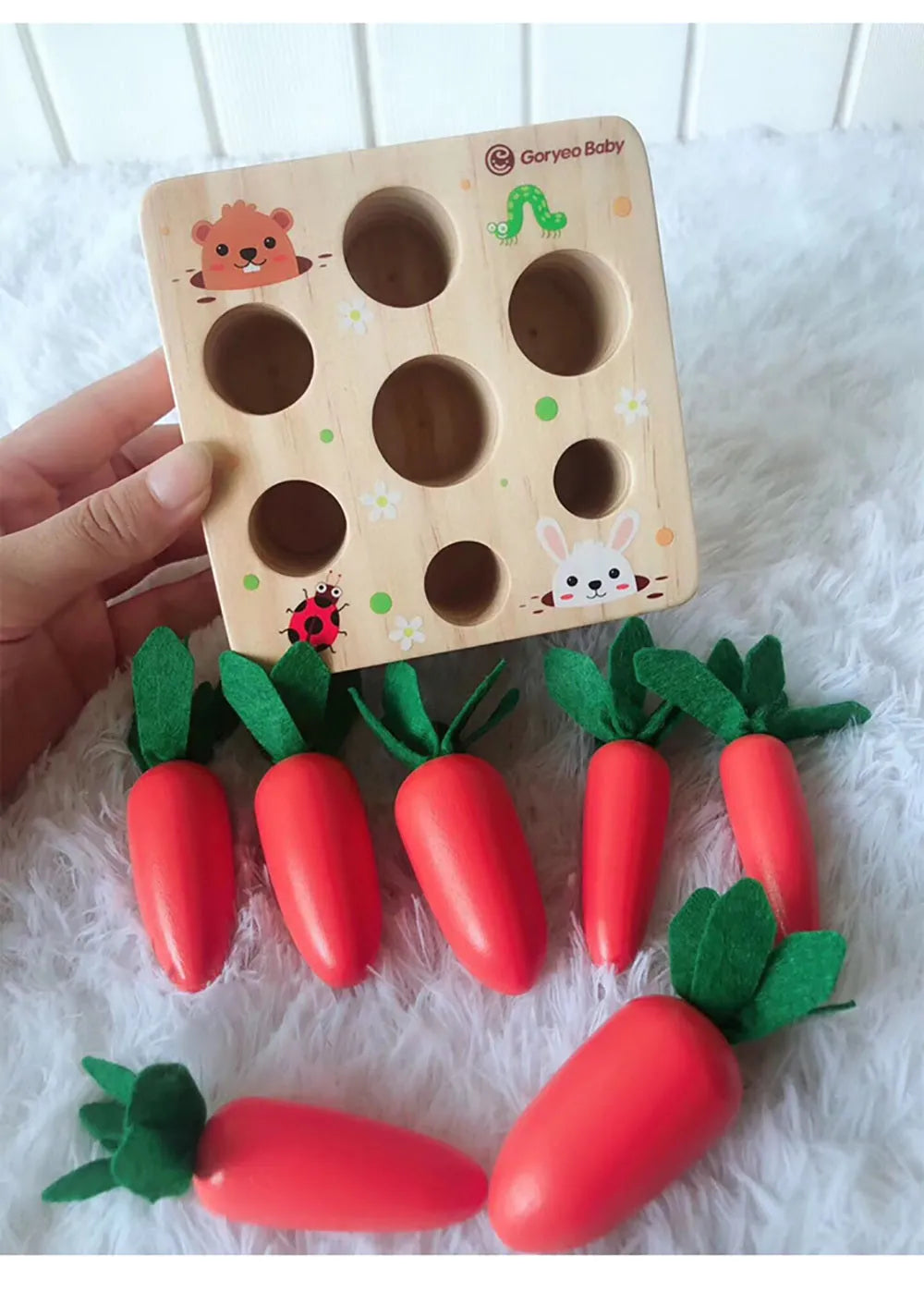 Wooden educational toy shaped like harvest carrots for toddler cognitive development.