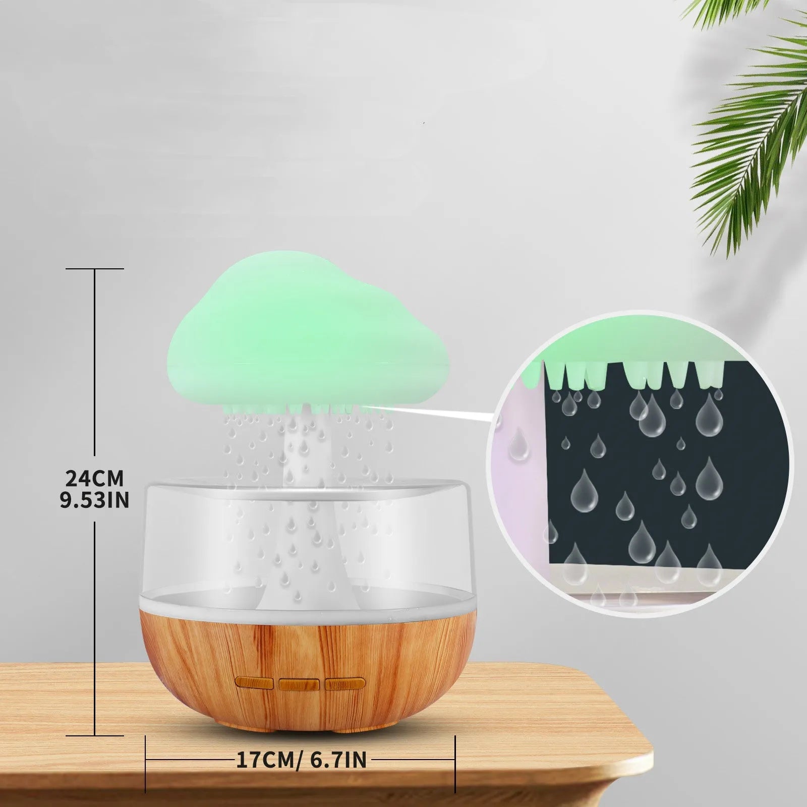 White cloud-shaped humidifier with coloured night light on a table.