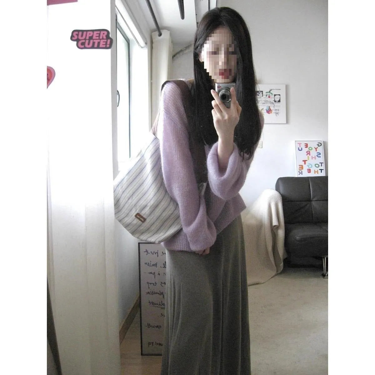 Women's purple round neck lightweight sweater with princess sleeves and hollow out design.