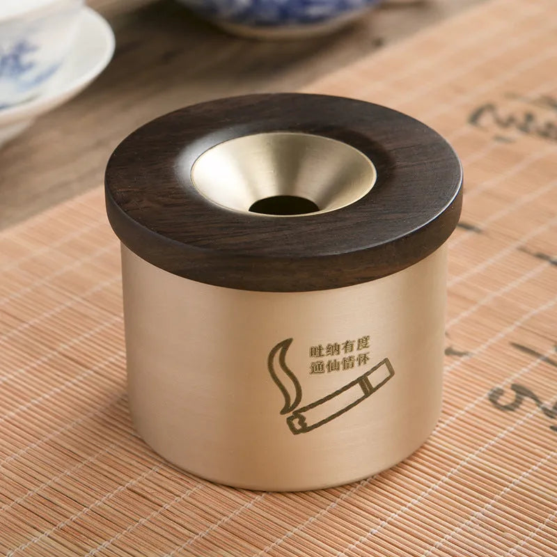 Retro solid copper ashtray with a wooden lid featuring a centre hole, shown with black and red wood options.
