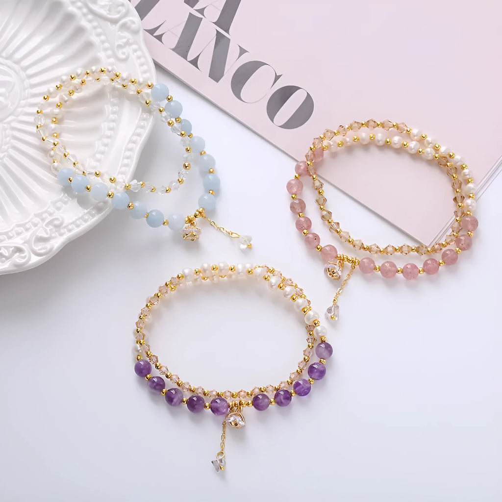 Natural freshwater pearl and crystal double ring bracelet in strawberry quartz, amethyst, or aquamarine.