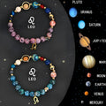 Two layered natural stone beaded bracelets with an adjustable clasp on a wrist.